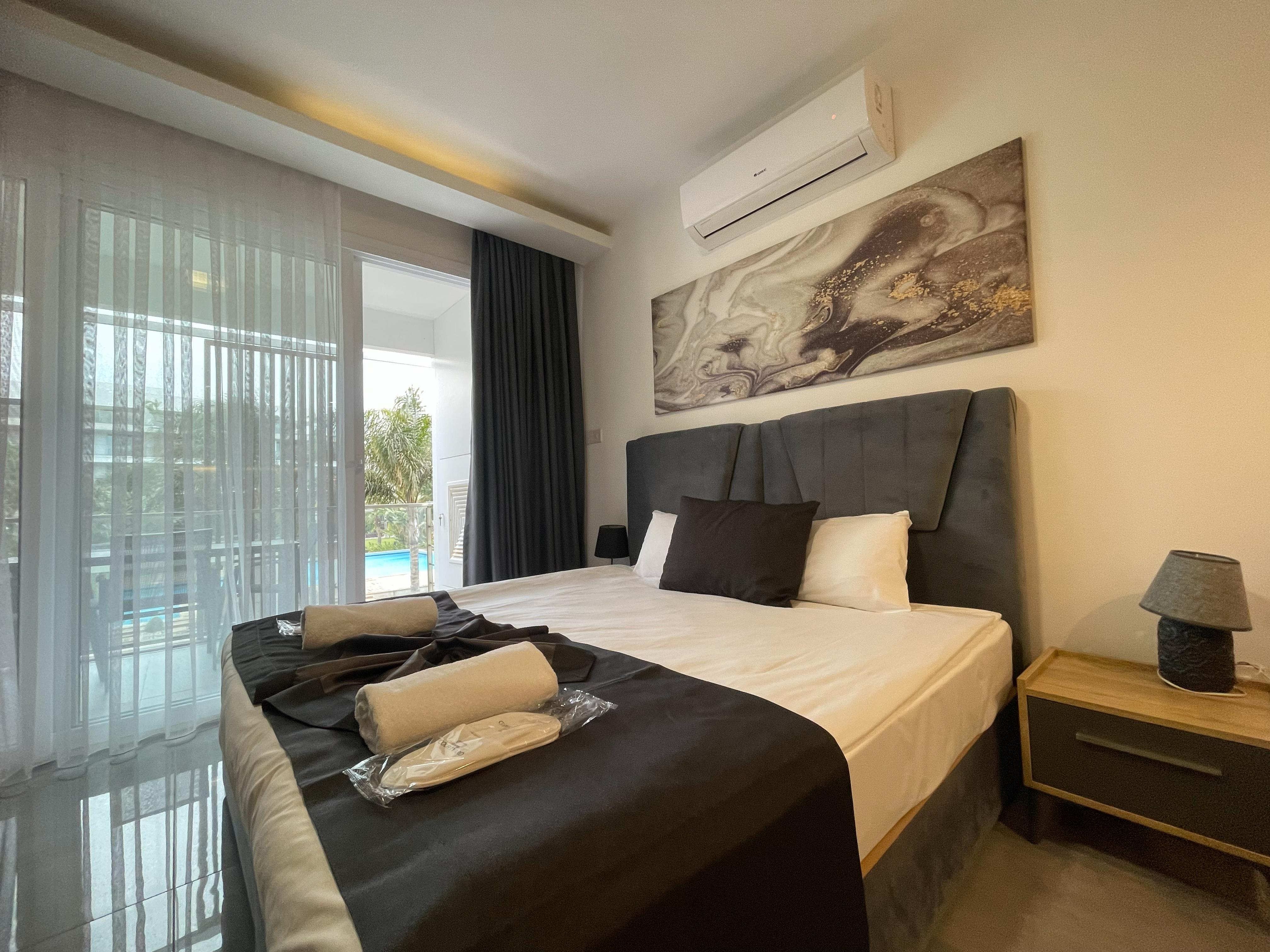 Studio - Bedroom with Pool View